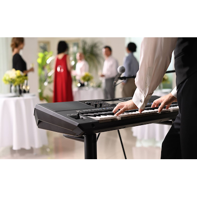 Yamaha Arranger Workstation PSR-SX920 being played at a party venue. 