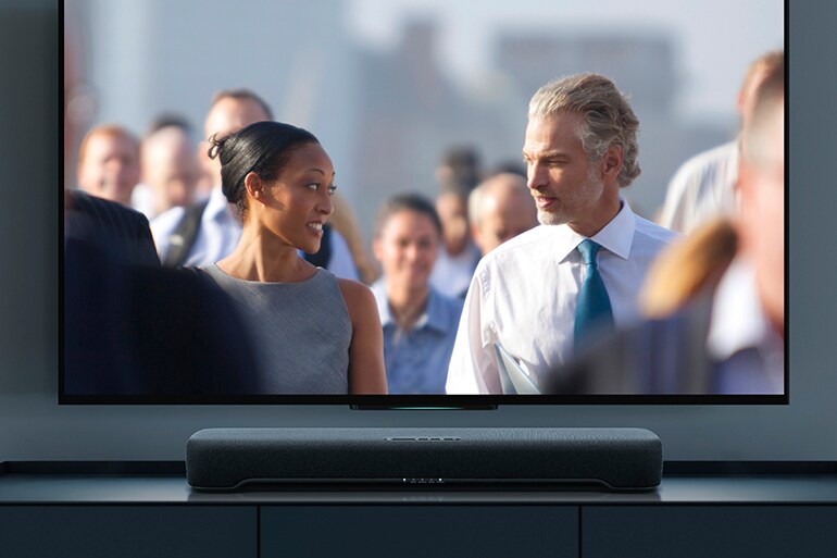 B200A below a TV displaying a film scene