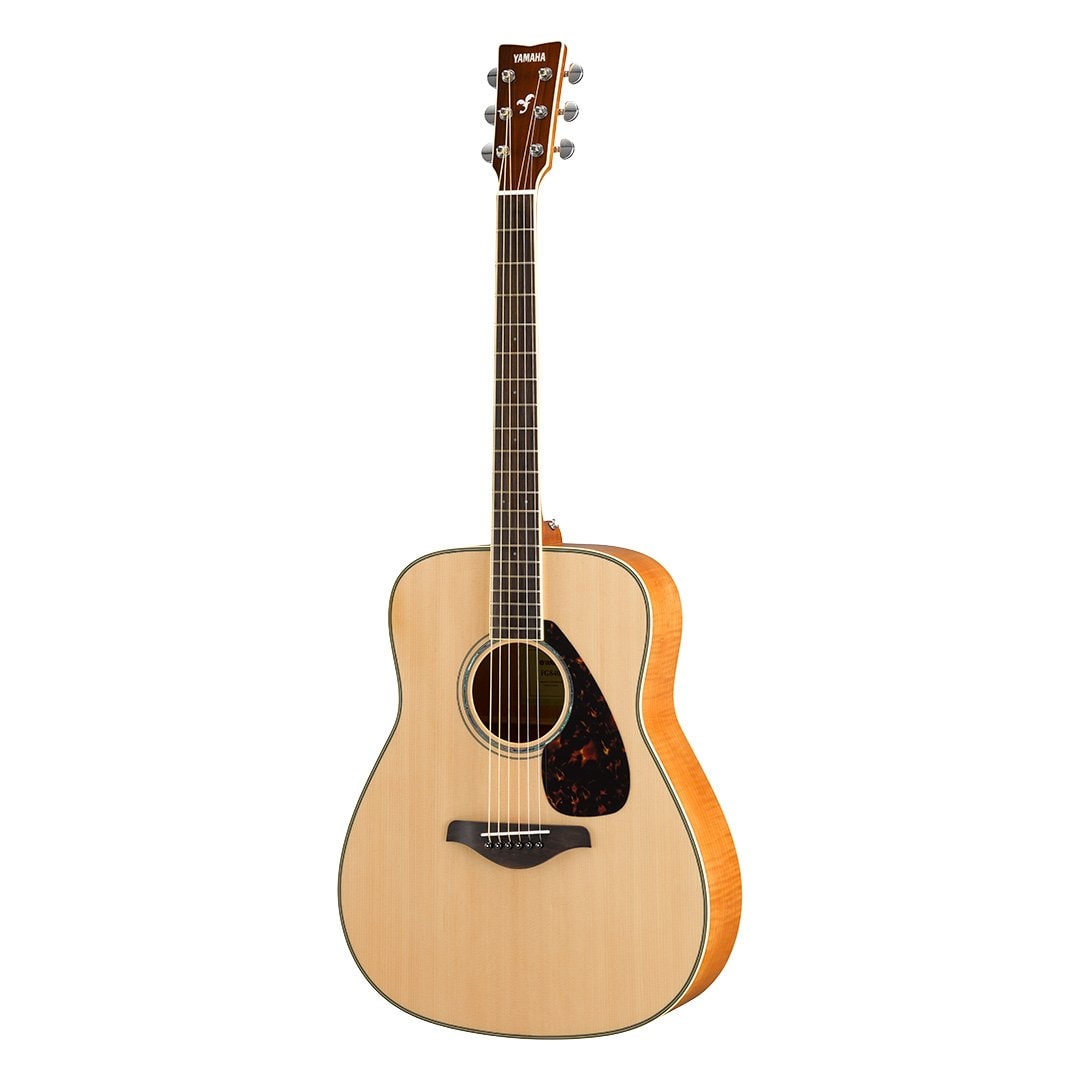 Yamaha solid top deals guitar