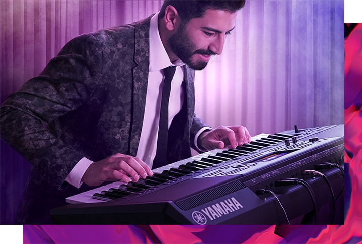 A man playing Yamaha Arranger Workstation Keyboard PSR-A5000