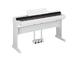 Diagonal side view of the P-S500WH (white model) in combination with the optional stand and three-pedal pedal unit